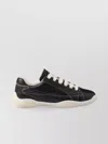 Prada Handcrafted Leather Sneakers Geometric Stitching In Black
