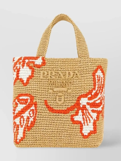 Prada Handwoven Tote With Dual Handles And Striking Accents In Beige
