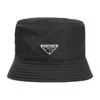 Prada Triangle Logo Re-nylon Bucket Hat In Black