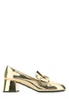 Prada Logo Plaque Heeled Loafers In Gold