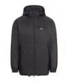Prada Re-nylon Puffer Jacket In Black