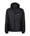 Prada Re-nylon Puffer Jacket In Blue
