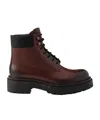 Prada Brown Calf Leather Boots With Modern Accents In Black
