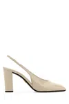 Prada 85 Patent Leather Slingback Pumps In Avorio
