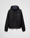 Prada Triangle Logo Zip-up Jacket In Schwarz/blau