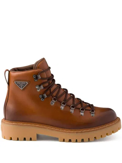 Prada Triangle-enamel Boots In Brown