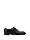 Prada Double-buckle Loafers In Black