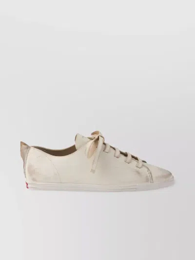 PRADA LACE-UP DISTRESSED LOW-TOP SNEAKERS