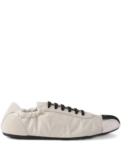 PRADA LOGO-DEBOSSED SNEAKERS