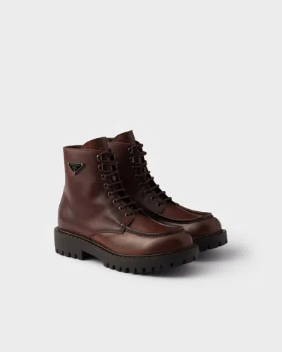 PRADA LACED LEATHER BOOTIES