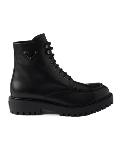Prada Laced Leather Booties In Black