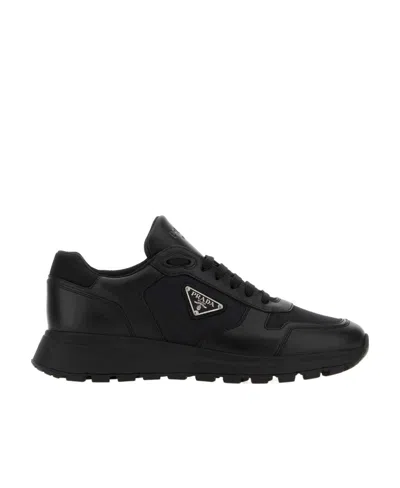 Prada Laced Sneakers In Black