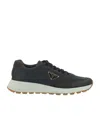 Prada Laced Sneakers In Green