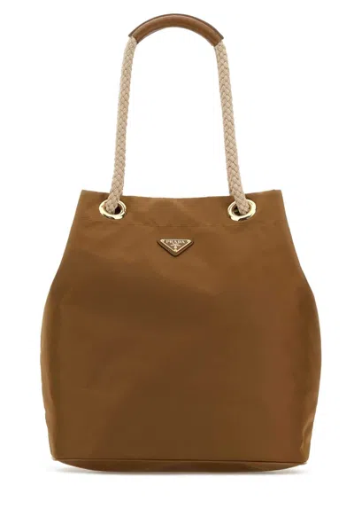 Prada Large Re-nylon Mariner Bucket Handbag With Calf Leather Trim In Brown