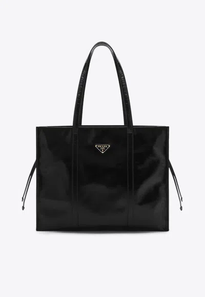 Prada Large Triangle Logo Leather Tote Bag In Black