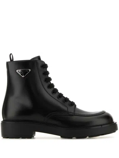 Prada Logo-plaque Panelled Ankle Boots In Black