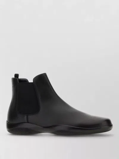 Prada Leather Ankle Boots Smooth Finish Pull Tab In Black