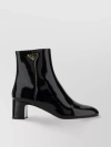 PRADA LEATHER ANKLE BOOTS WITH ICONIC METAL TRIANGLE