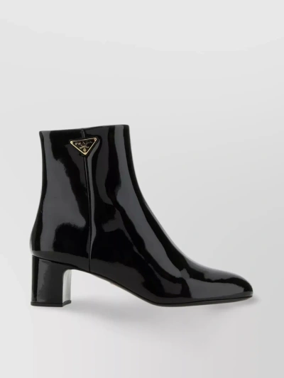 Prada Leather Ankle Boots With Iconic Metal Triangle In Black