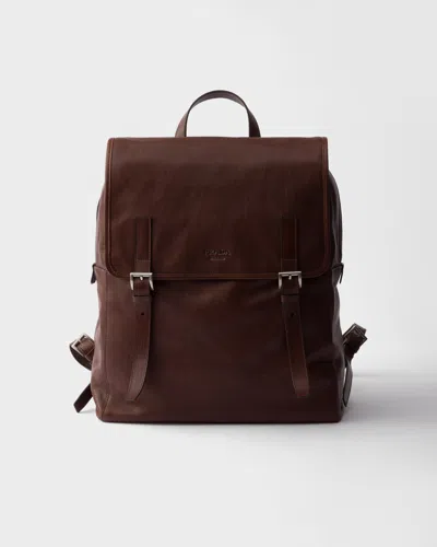 Prada Buckled Leather Backpack In Burgundy