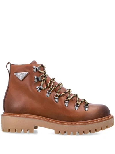 Prada Triangle-enamel Boots In Brown