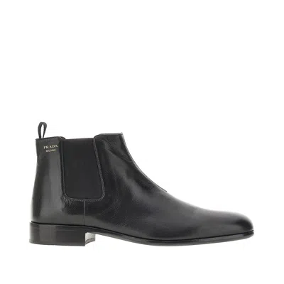 Prada Leather Boots With Logo Print In Black