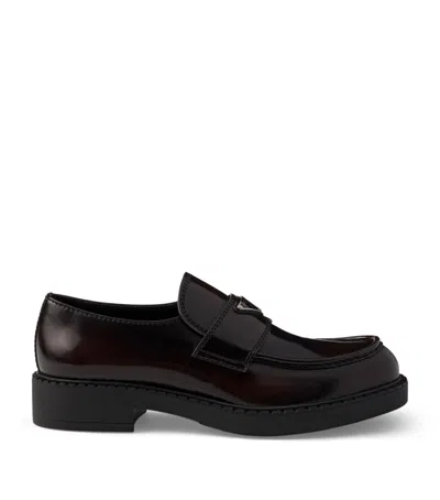 Prada Leather Brushed Triangle Loafers In Brown