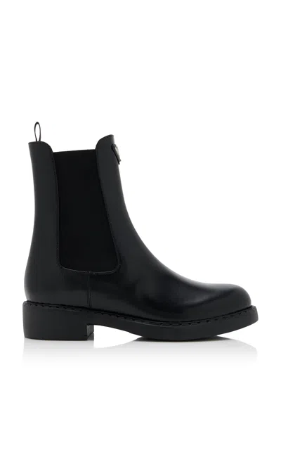 Prada Brushed Leather Ankle Boots In Black