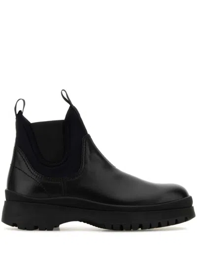 Prada Chunky Sole Leather Ankle Boots In Black
