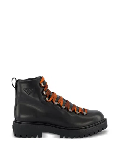 Prada Leather Combat Boots With Embossed Logo In Black