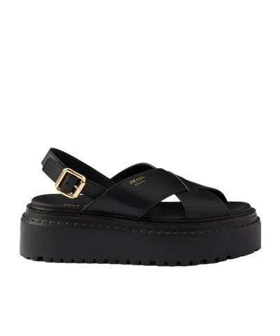 PRADA PRADA CROSSOVER STRAP DETAILED SLINGBACK SANDALS