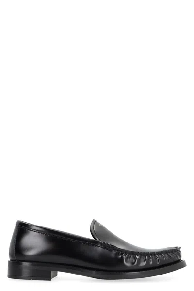 Prada Patent Leather Logo Loafers In Black