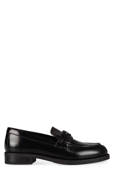 Prada Leather Loafers With Decorative Buckle And Round Toe In Black