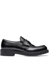 Prada Triangle Logo Brushed Leather Loafers In Black