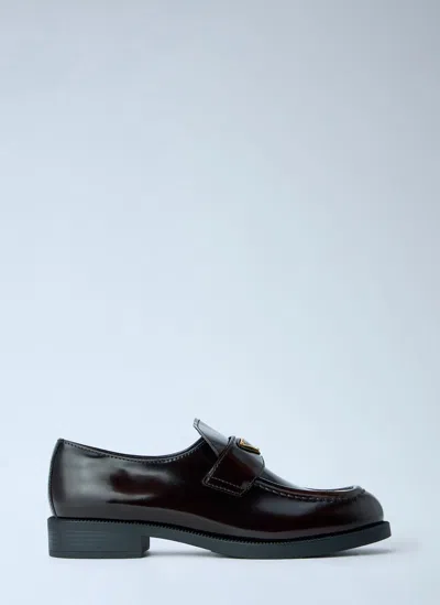 Prada Leather Loafers With Logo Plaque In Blue