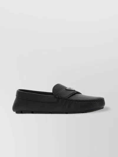 PRADA LEATHER LOAFERS WITH METAL DETAIL AND ROUND TOE