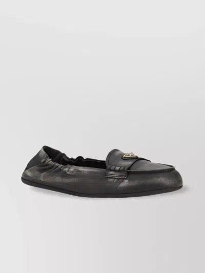 PRADA LEATHER LOAFERS WITH ROUND TOE AND VINTAGE LOOK