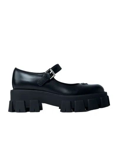 PRADA LEATHER LOGO PLAQUE PLATFORM FLATS