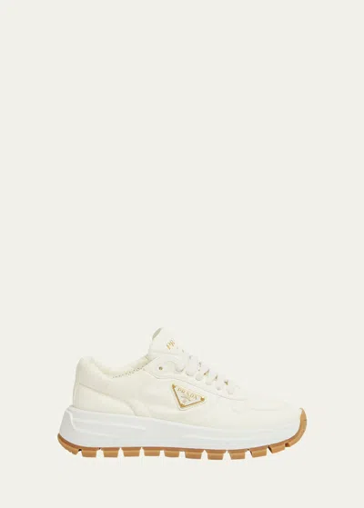 Prada Leather Logo Runner Sneakers In Avorio