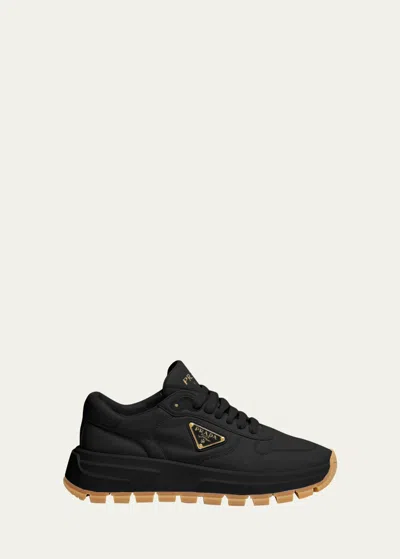 Prada Leather Logo Runner Sneakers In Nero