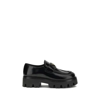 PRADA LEATHER MONOLITH LOAFERS