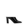 Prada Leather Block Heel Mules With Pointed Toe In Animal Print