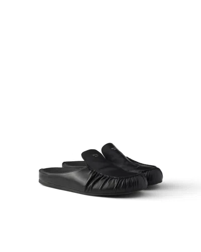 PRADA MULES AUS LEDER