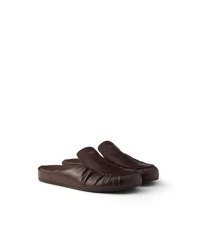 Prada Leather Mules In Brown