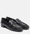 Prada Rounded Toe Loafers With Textured Detailing And Low Block Heel In Black