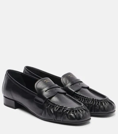 Prada Rounded Toe Loafers With Textured Detailing And Low Block Heel In Black