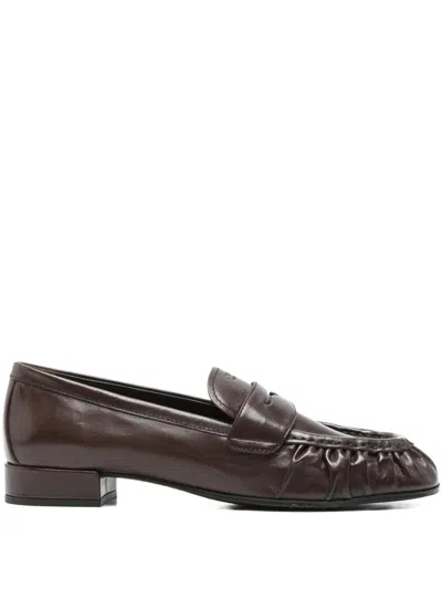 PRADA LEATHER PENNY LOAFERS