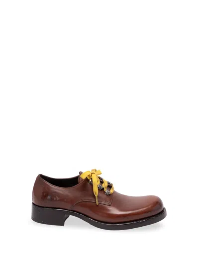 Prada Leather Pumps In Brown