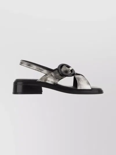 PRADA LEATHER SANDALS FEATURING BUCKLE AND METALLIC FINISH