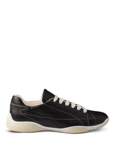 Prada Sneakers Aus Leder In Schwarz